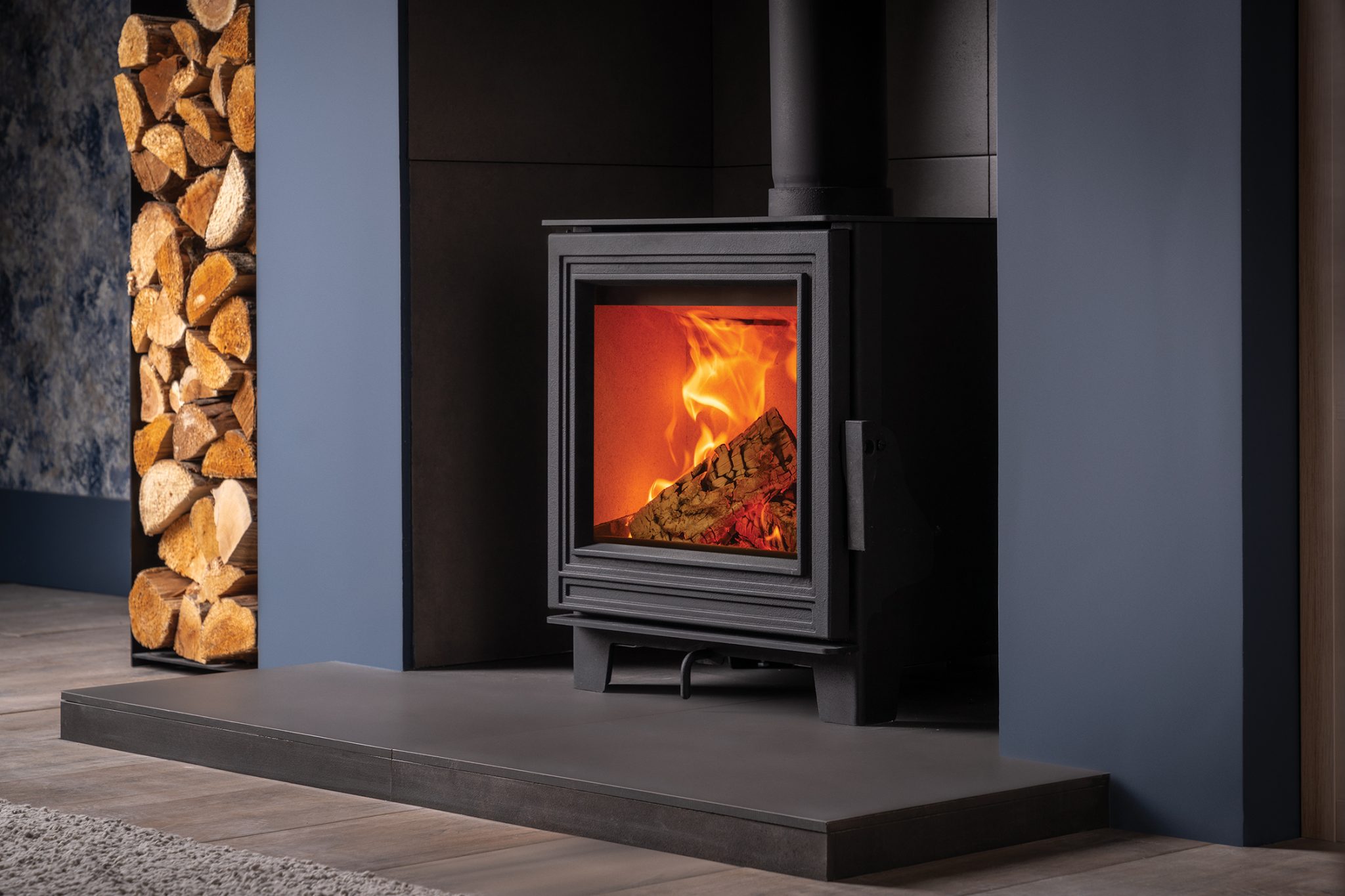 Eton_07 FireFX Eton 5 wood-burning stove in a contemporary fireplace setting